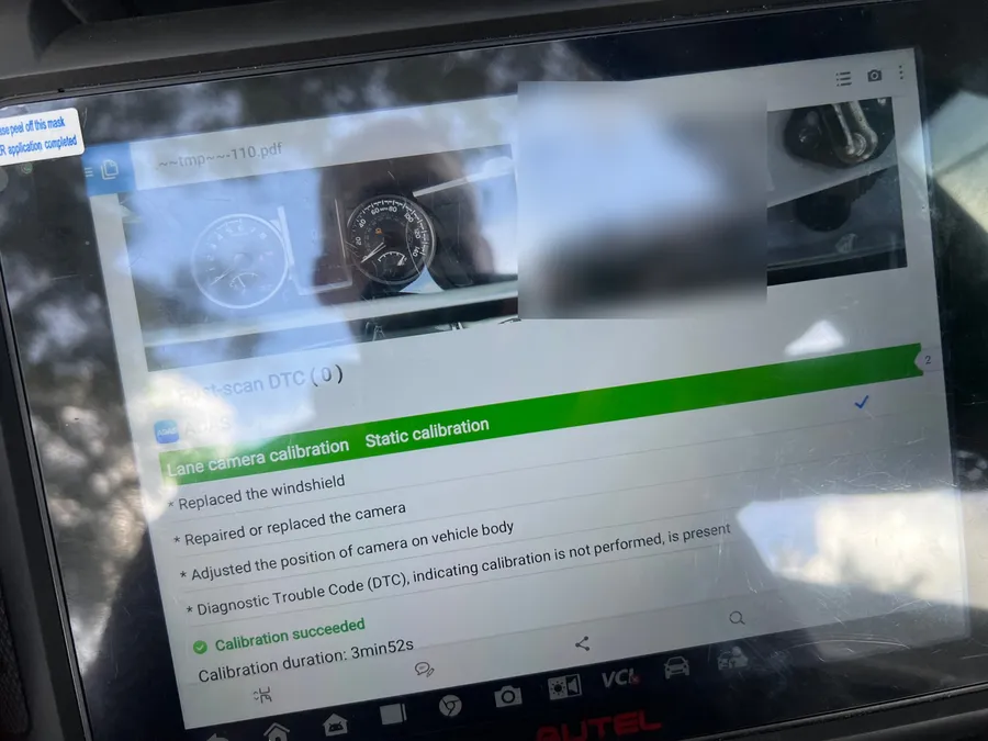 Autel scan tool showing lane camera static calibration succeeded on a Toyota Tacoma in Lake Nona, Orlando FL