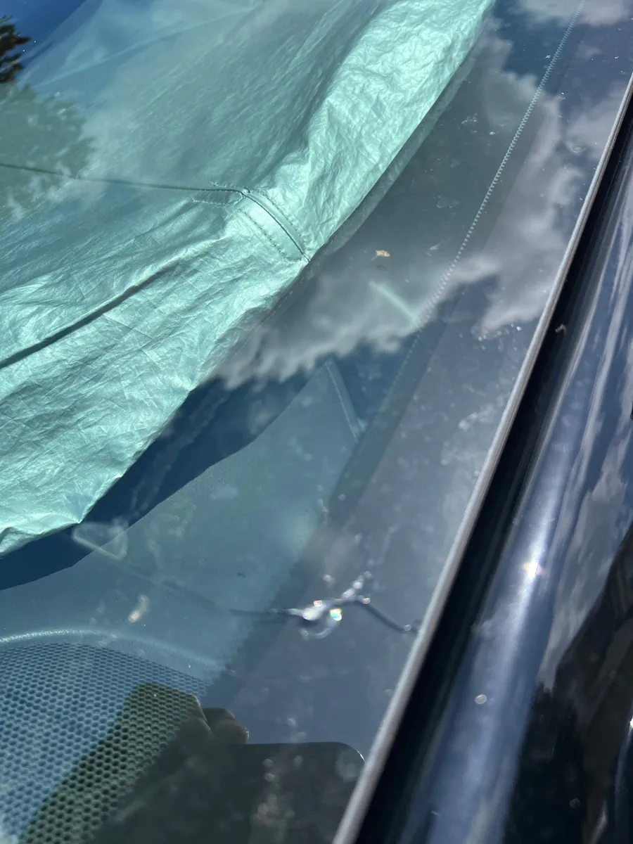 Crack at the lower edge of the windshield on a 2024 Chevrolet Tahoe in Winter Garden, FL